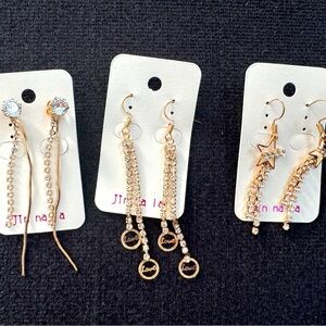 Set of 3 pairs of gold tone, faux diamond earrings. New.